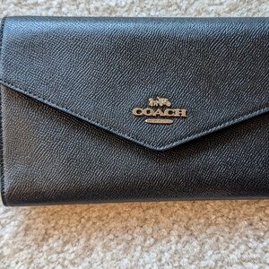Coach Black Textured Leather Clutch - Travel Envelope Wallet
Item# C0707 IMBLK